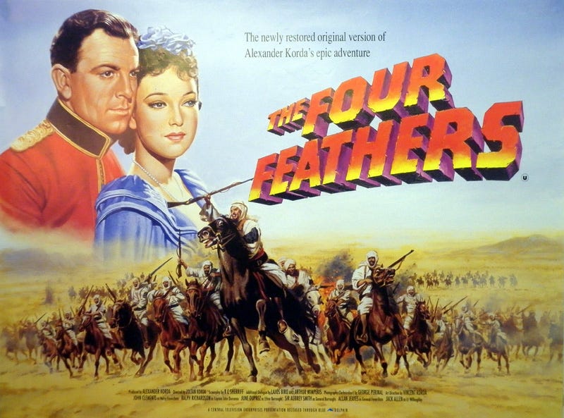 A large picture man in red uniform and woman in a blue dress in the horizon to the left. The Four Feathers movie title. In the foreground, men wearing turbans riding horses carrying guys.